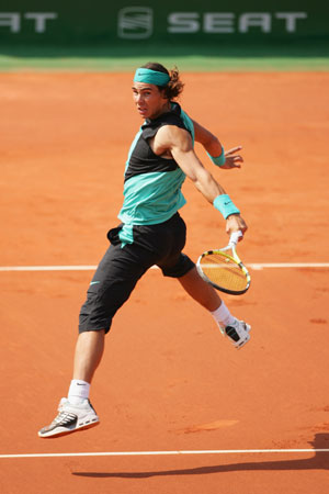 rafael-nadal-hitting-one-handed-backhand.jpg