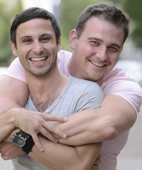 guys-holding-each-other.jpg