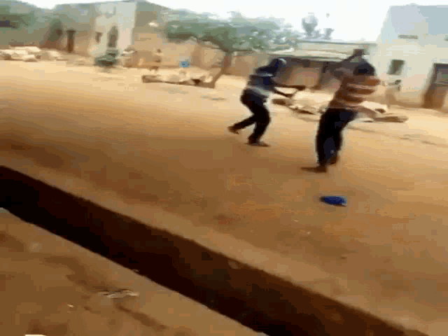 two-african-guys-fighting-men-fighting.gif
