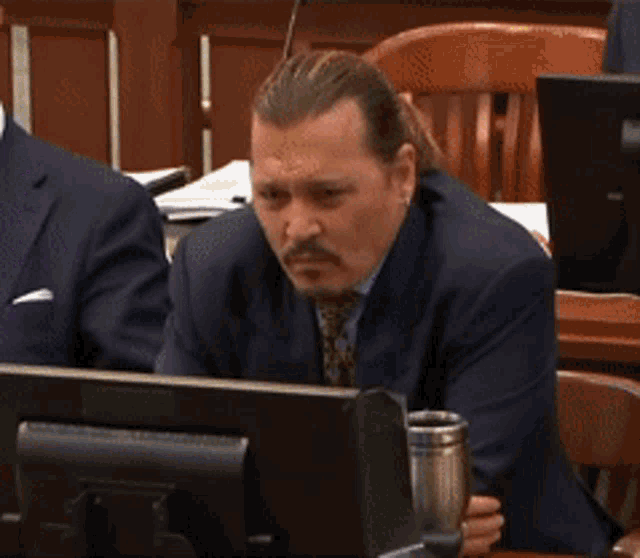 johnny-depp-facepalm.gif