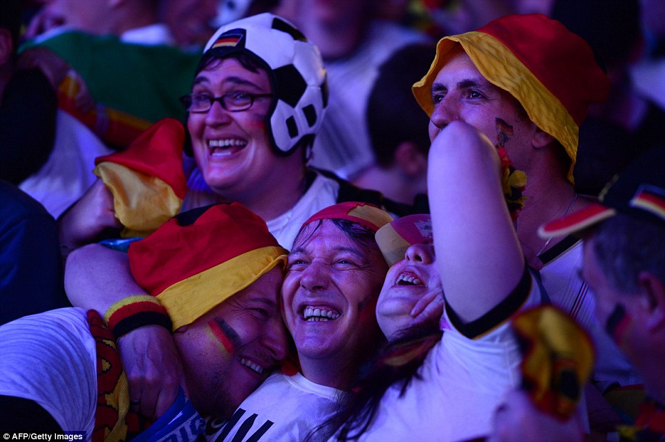 1404854101408_wps_38_Germany_fans_react_as_Ger.jpg