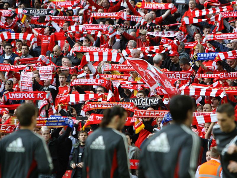 Liverpool-s-players-warm-up-in-front-of-their_2724533.jpg