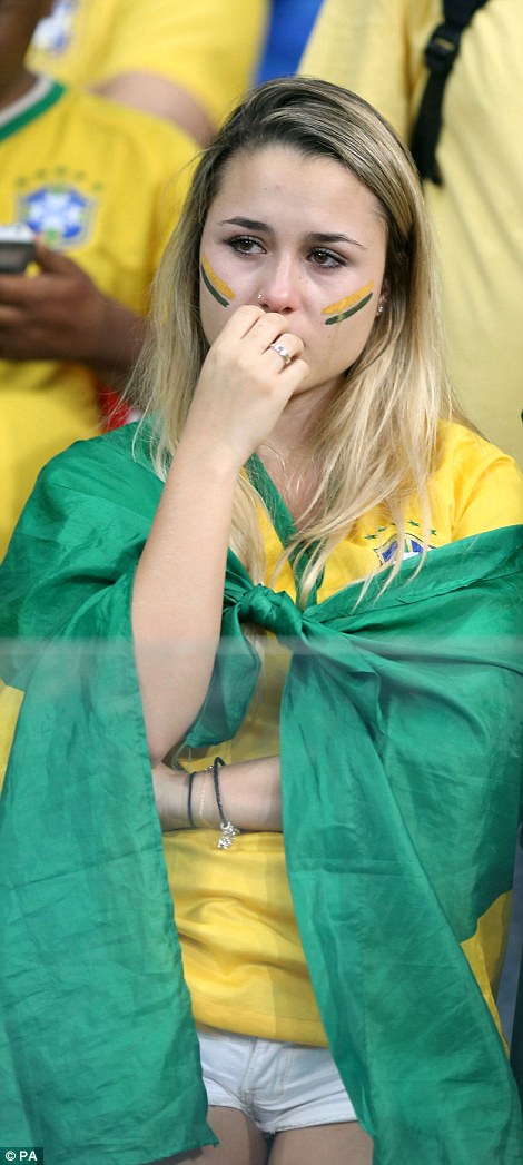 1404853715681_wps_31_Brazil_fans_dejected_in_t.jpg